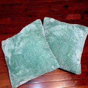Fuzzy teal pillows